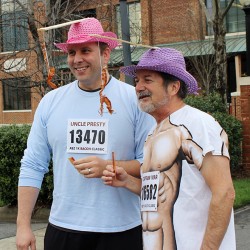 Preston and Martin revel in bacon at the Bacon 1K finish line.